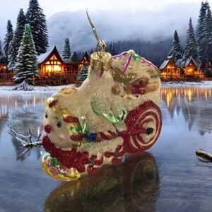 Glass train, ornament, red white and green, cute face take them home and…